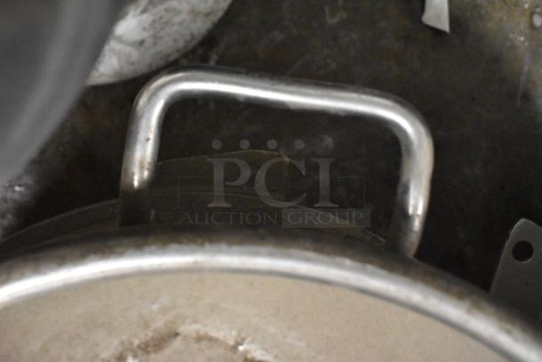 Mixing bowls and dough hook attachments for Hobart mixer, metal finish, used condition, featuring sturdy handles.