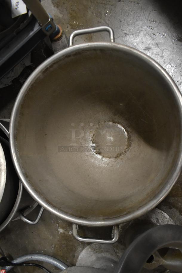 Stainless steel mixing bowl for Hobart mixer, visible wear, includes 2 additional bowls and 5 dough hooks.