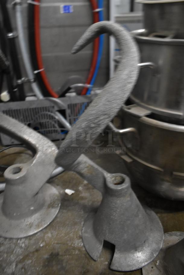 8 various items including 3 mixing bowls and 5 dough hook attachments for Hobart mixer, in used condition.