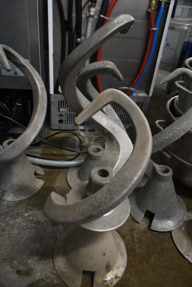 Set of 5 dough hook attachments for Hobart mixer, made of metal. Used condition, ideal for commercial mixing.