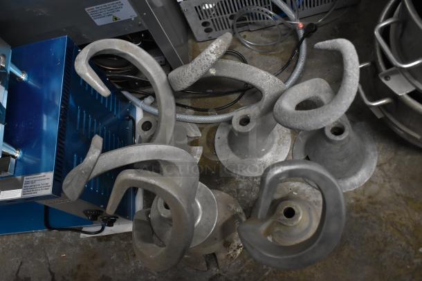 Eight items, including five dough hook attachments and three mixing bowls for Hobart mixer. Used condition.