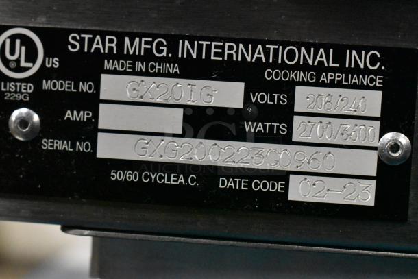 Alt text: Close-up of label on Star GX20IG Commercial Sandwich Grill, showing model number, voltage, and serial details.