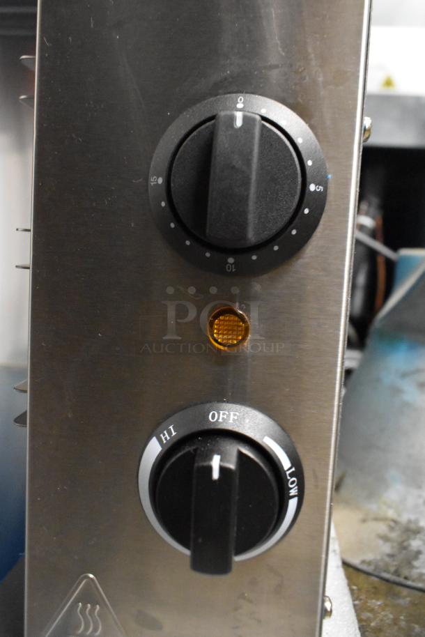 Brand new Avantco 177CHSME32M stainless steel cheese melter, 32" with adjustable knobs, scratch and dent condition.