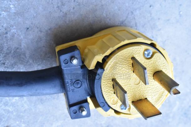 Plug for Nieco JF93E Charbroiled Burger Grill, 208V, 3 Phase, showing yellow connector and "Made in Mexico" label.