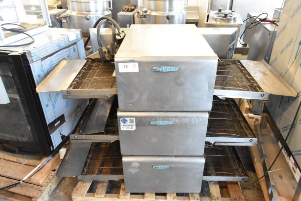 3 Turbochef HhC2020 commercial conveyor ovens, electric, 208/240V, 3 phase, stainless steel, stacked on pallets.
