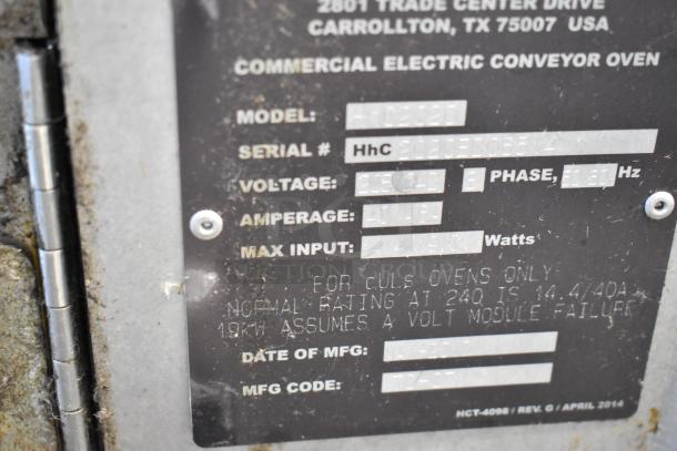 Turbochef HhC2020 commercial oven label showing model, voltage, phase, amperage, and manufacturing details.
