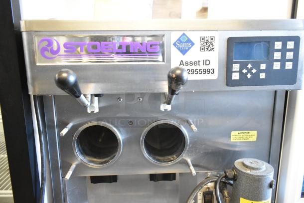 Stoelting stainless steel commercial countertop soft serve ice cream machine with drink mixing attachment. Asset ID: 2955993.
