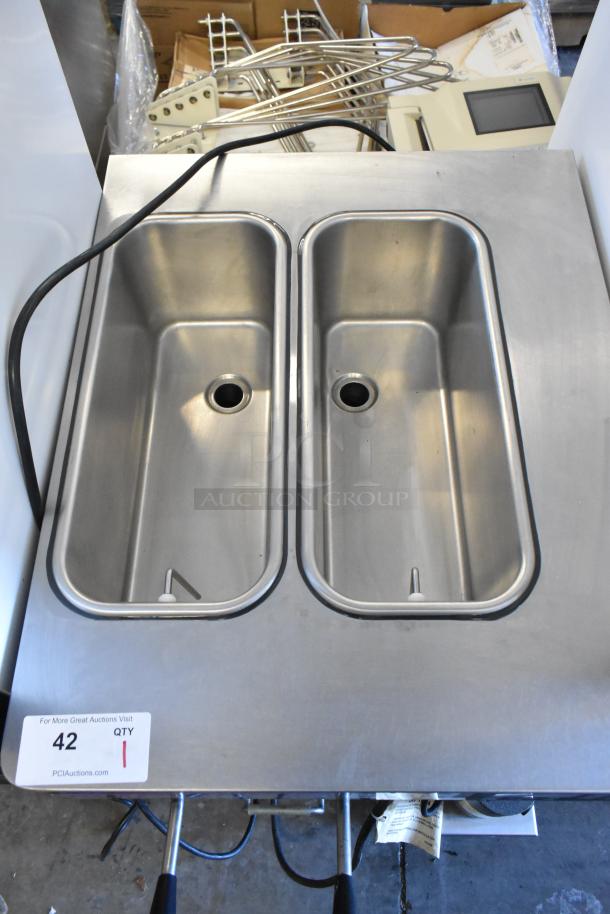 Stoelting stainless steel commercial countertop soft serve ice cream machine, dual compartments, with drink mixing attachment, shown with auction tag "42".