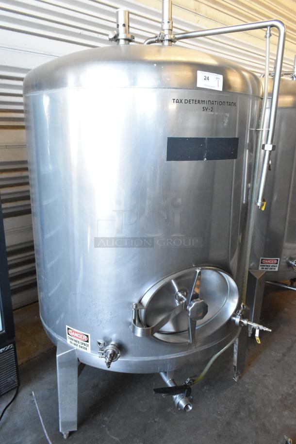Stainless steel 8.75 BBL / 367 gallon commercial beer tax determination tank with clear beer indicator, in floor style, features a danger label.