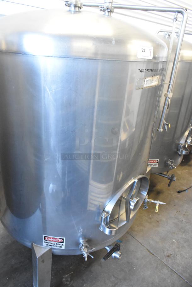 Stainless steel 8.75 BBL beer tax determination tank in good condition, featuring valves and safety labels. Capacity: 367 gallons.