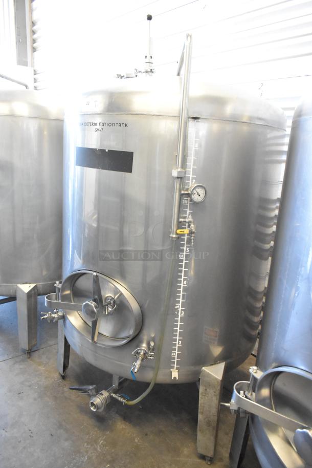 Stainless steel 8.75 BBL, 367-gallon beer tax determination tank with valve controls, gauge, and measurement markings.