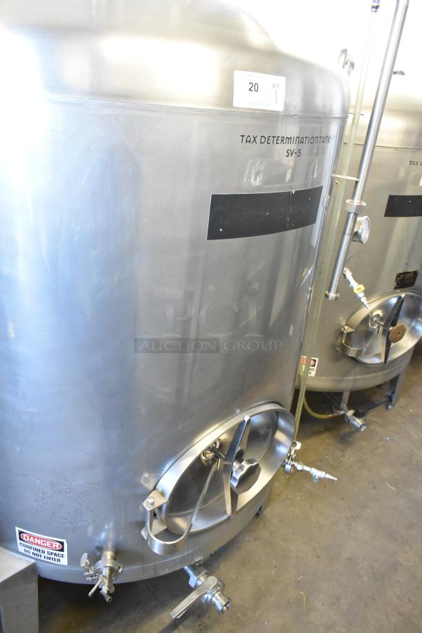 Stainless steel 8.75 BBL beer tax determination tank in good condition, features "Confined Space" warning label.