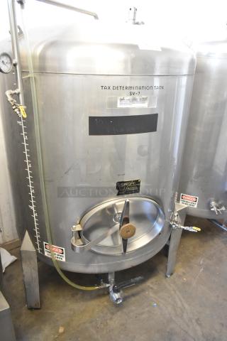 Stainless steel commercial 8 BBL/336-gallon beer tank, labeled "Tax Determination Tank SV-7," features gauges and safety warnings.