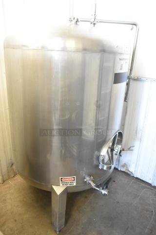 Stainless steel 8.75 BBL/367-gallon beer determination tank in good condition with fittings and "Tax Determination" label.