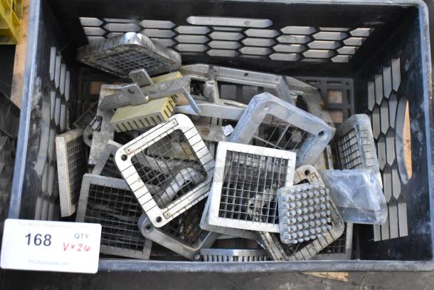 Assorted vegetable slicer blades in a crate, metal grid design, various conditions, includes 26 pieces. Label shows "Quantity: 26."