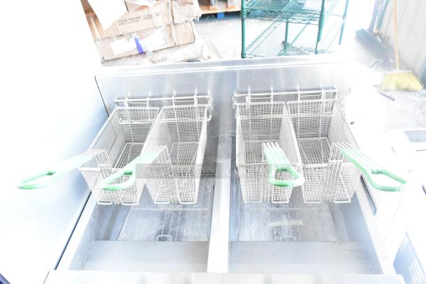 BRAND NEW 2021 Frymaster FPPH255CSE commercial propane fryer with 4 metal baskets, filtration system, on casters, 80,000 BTU.