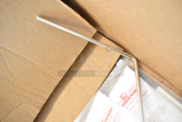 Cardboard box interior with a metal rod and cleaning powder packets. Not the Frymaster fryer.