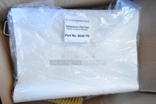 Brand new Frymaster FPPH255CSE fryer with 4 metal baskets, propane-powered, filtration system, 80,000 BTU, on caster wheels.