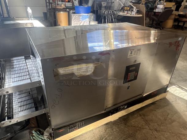 Middleby Marshal CTX 340141 stainless steel double conveyor pizza oven, electric, 3-phase, with control panel, in used condition.
