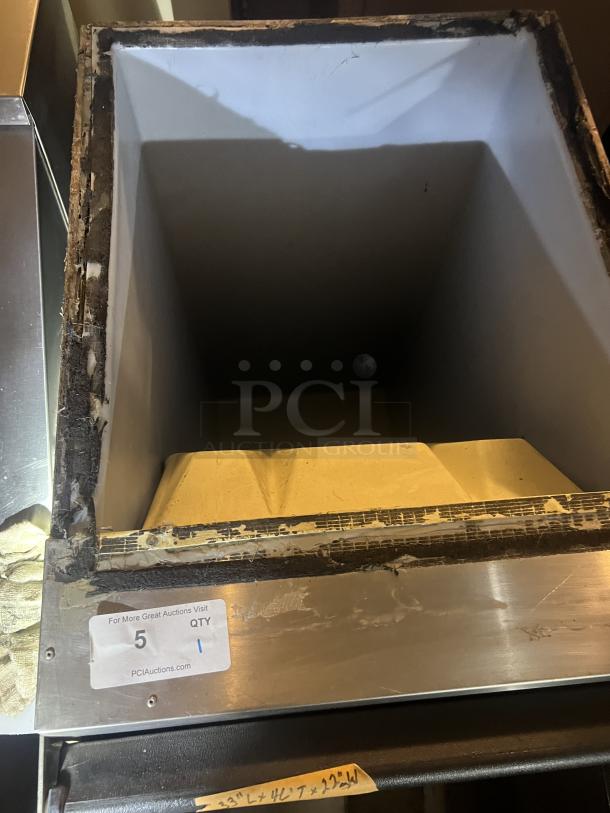 Stainless steel ice holding bin, 22x33x46 inches, visible wear. Marked with auction tag "5 QTY" from PCI Auctions.
