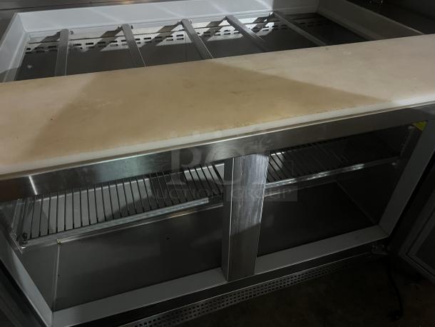 Berg stainless steel prep table, model EDMT-48 18 BERG, features cutting board top, shelving, 48x34½x47, 120v, 293 lbs.