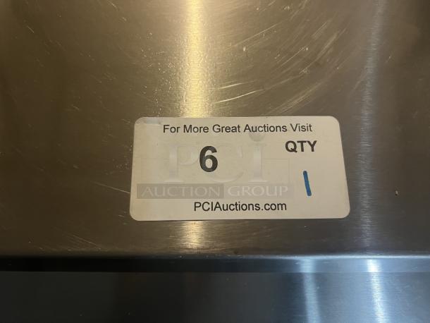 Berg Stainless Steel Prep Table, Model EDMT-48 18, 48"x34½"x47", 120v, 293 lbs, clean surface, auction label visible.