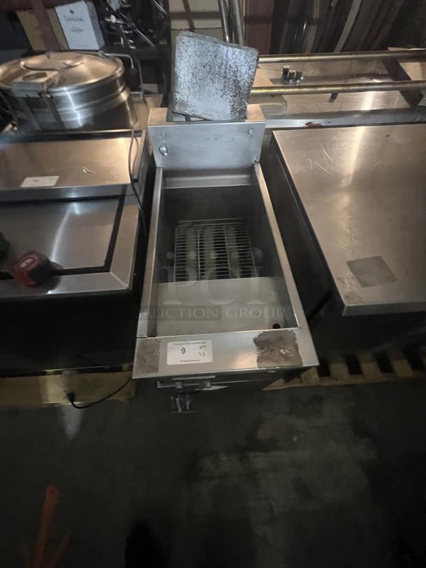 Stainless steel pasta boiler, dimensions 16 x 37 x 39.5 inches, includes visible internal grate, moderate wear.