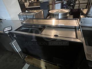 True Underbar Reach-in Bottle Cooler, Model TD-50-18, 49-¾"x27"x33-½", stainless steel, sliding lids, commercial use.