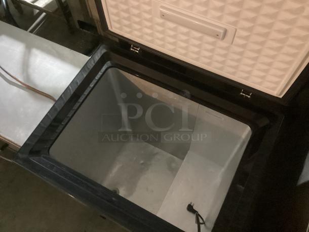 Ice Cream Factory Deep Freezer, model BD-150B-E, dimensions 27-¼ x 21 x 33, black interior, open lid, good condition.