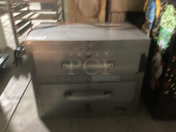 Toastwell Warming Drawers, Model FFW-2, stainless steel, 28x19x23 inches. Features dual drawers, visible wear on exterior.