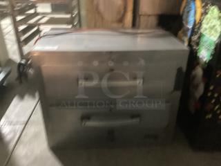 Toastwell Warming Drawers, Model FFW-2, stainless steel, 28x19x23 inches. Features dual drawers, visible wear on exterior.