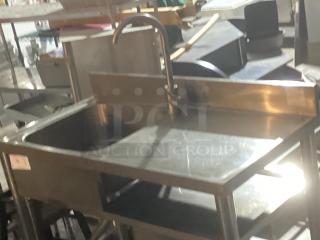 Stainless steel single sink workstation, dimensions 39-½ x 20 x 35-3/4, with gooseneck faucet, good condition.