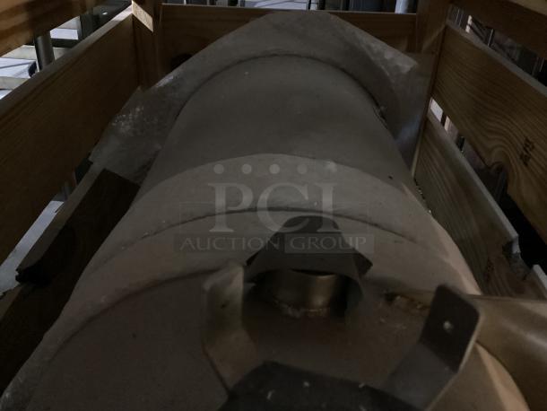 Large cylindrical tank in wooden crate, dimensions 48 x 25 x 33 inches, appears unused with protective packaging visible.