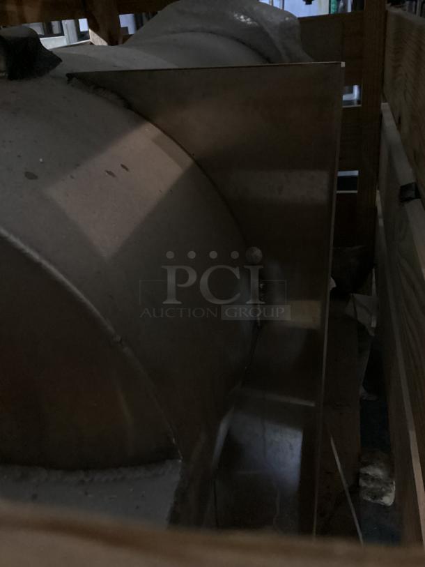 Industrial tank in crate, 48x25x33, metal, used condition, minimal visible wear, no tags or markings shown.