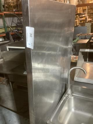 Stainless steel table, 72x30x36 inches, in used condition. Features sturdy construction and smooth surface. Auction label: lot 300.