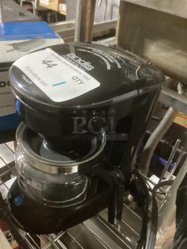 Andi's Commercial 4-Cup Coffee Pot, black, glass carafe, visible power button, commercial use. Good condition. Brand tag on top.