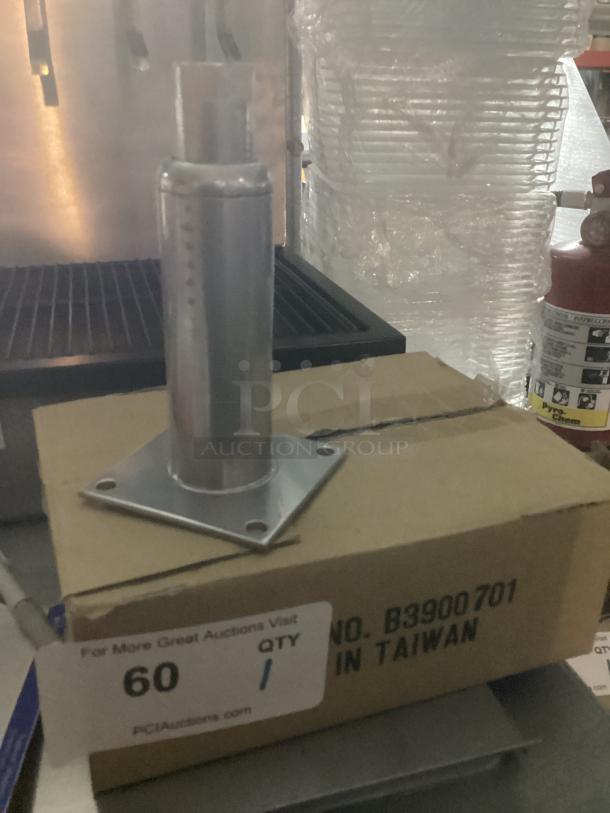 Set of 4 plate mount 4-hole replacement legs, 6" tall, silver tone, on a cardboard box. Made in Taiwan.