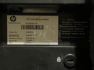 HP LA2205WG 22" LCD monitor, serial 3CQ0330LY6, manufactured August 2010. Includes keyboard and mouse.