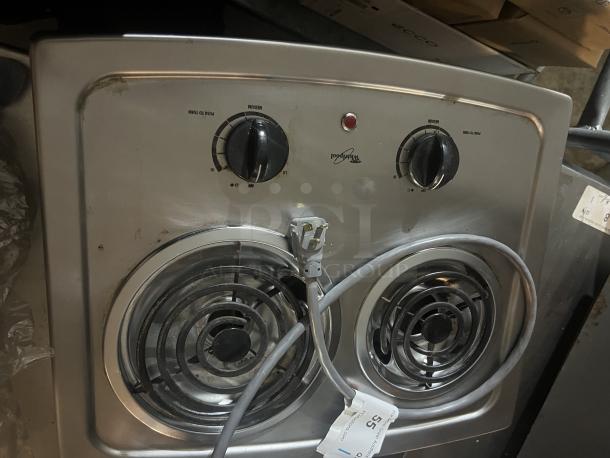 Whirlpool 2-burner electric stovetop, model RCS2002RS04, 21x17 inches. Appears used with visible wear. Features dials and cord.