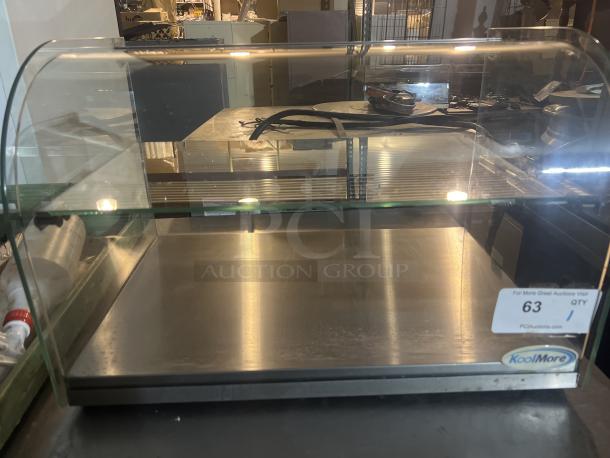 KoolMore glass bakery display case, 22x15x14 inches, tabletop model, transparent, stainless steel base, good condition.