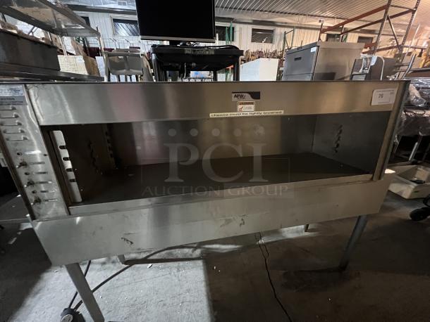 APW Wyott Cheese Melter CMW-40, stainless steel, 44.5"x17"x15.5", used condition, visible control panel and branding.