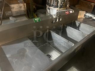Stainless steel 3-bay dish sink with faucet and nozzle, 92x31x44 inches, labeled wash, rinse, sanitize, in good condition.