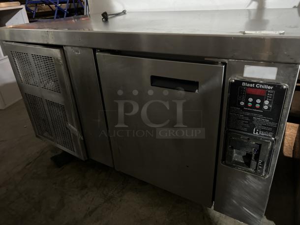 Industrial blast chiller by Randell, stainless steel, 56x34x33, not tested, visible control panel and air vents.