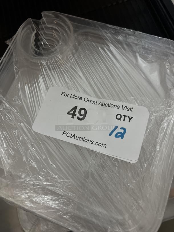 Clear appetizer/snack trays with a wine glass holder, set of 12, wrapped in plastic. Auction label states QTY 12.