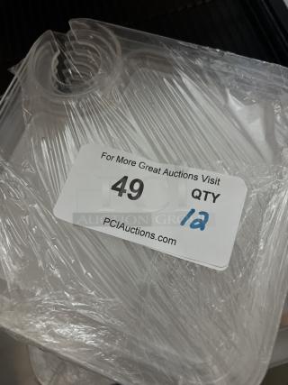 Clear appetizer/snack trays with a wine glass holder, set of 12, wrapped in plastic. Auction label states QTY 12.