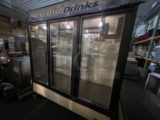 True 3-Door Refrigerated Cooler, 78"x30"x79.5", glass doors, metal shelving, "Cold Drinks" signage, used condition.