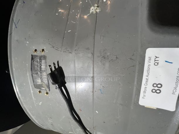 45" industrial fan, reconditioned, gray metal exterior with power cord. Auction tag reads "QTY 1" and number "88."