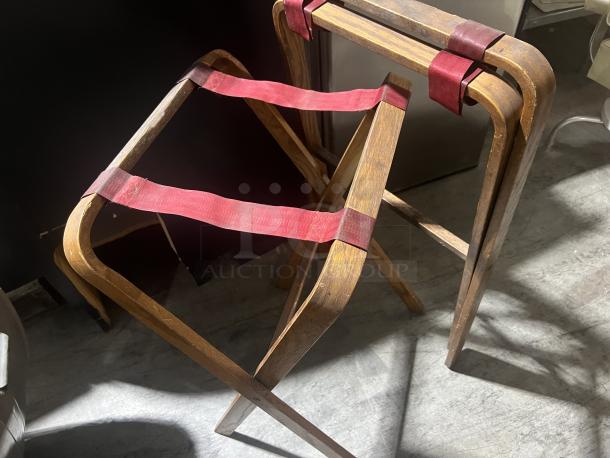 Two wooden waitress tray stands with red straps, in good condition. Ideal for restaurants or catering use.