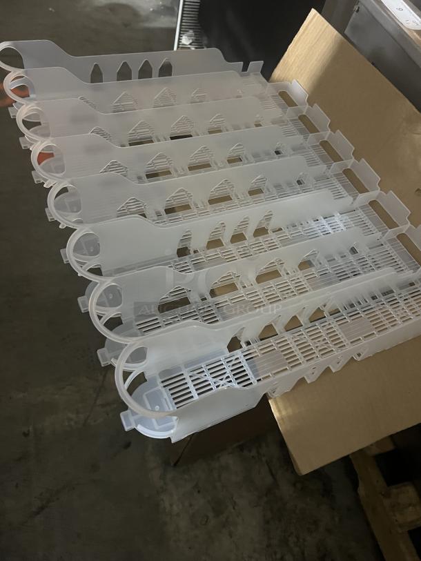 Display Technologies cooler soda bottle slides, plastic, qty 5, features slots for stability, pristine condition, no visible markings.