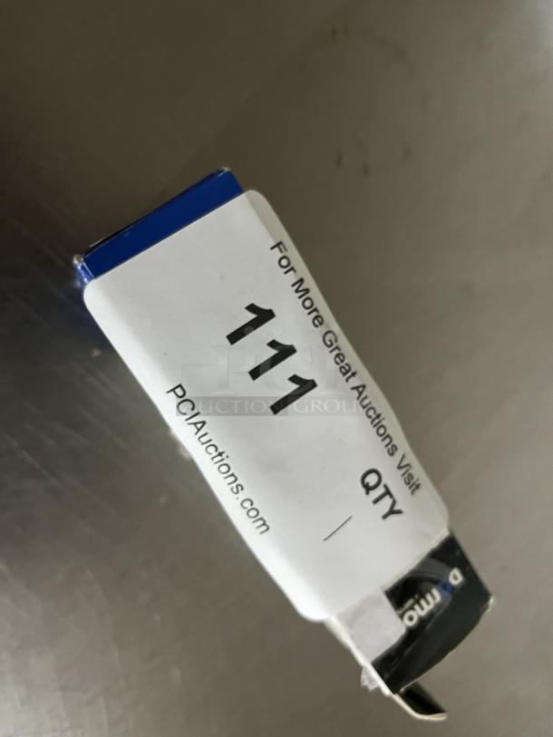 Snap and Go Gas Line Holder in original packaging, label showing item number 111 and website PCIauctions.com.